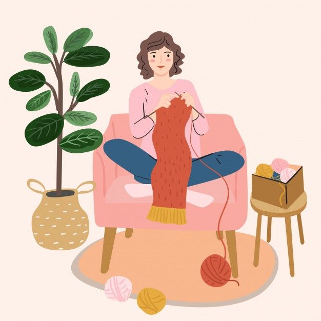 a woman knitting on a pink chair next to a potted plant