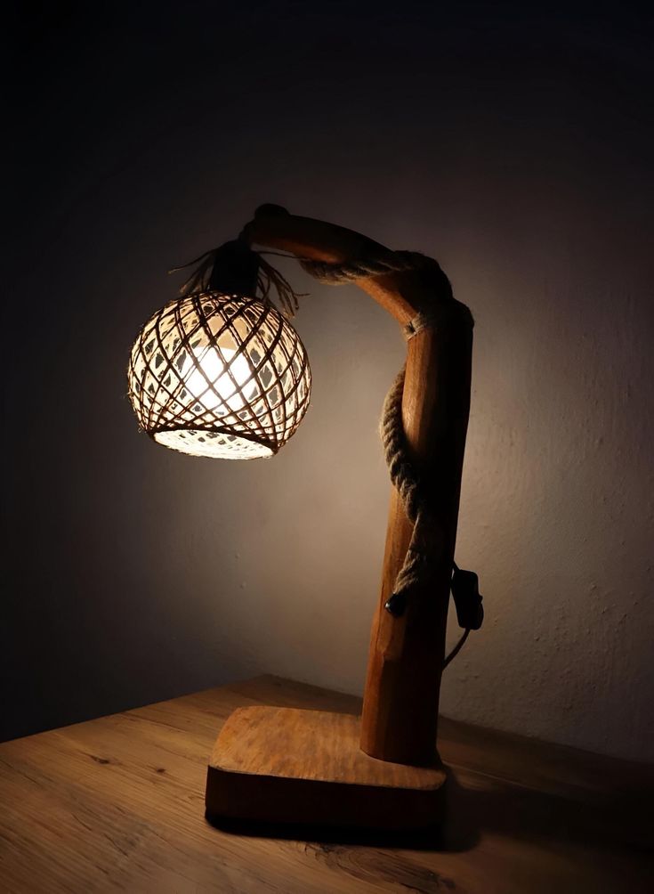 a lamp that is on top of a wooden table