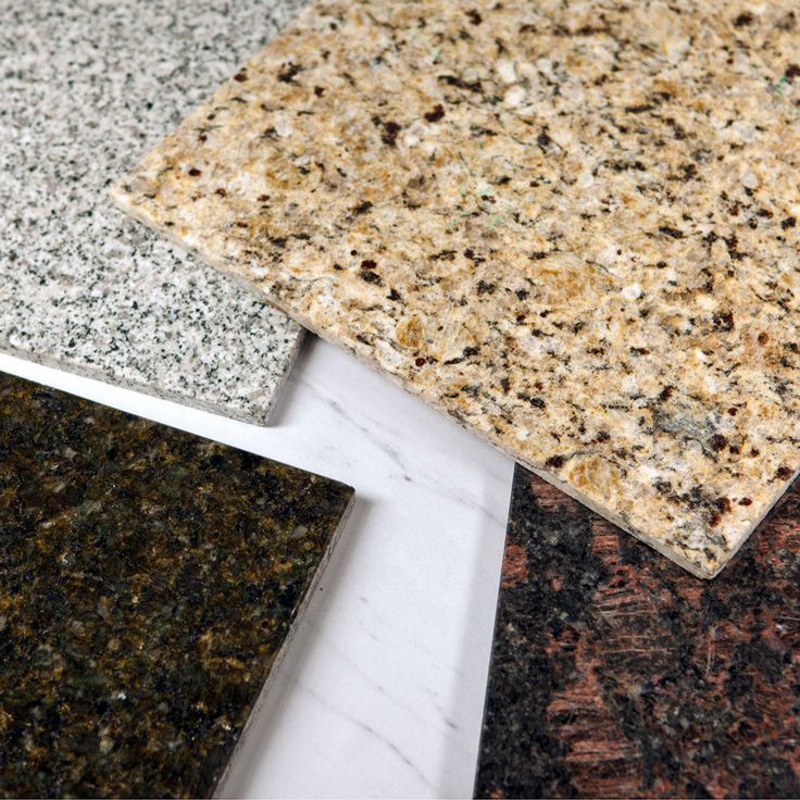 several different types of granites are shown in this close up photo, including black, white, and brown