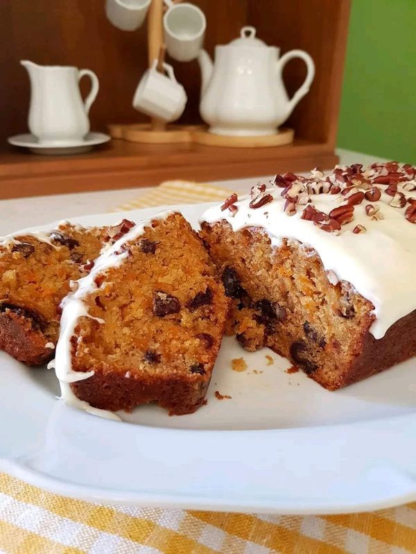 a white plate topped with slices of cake