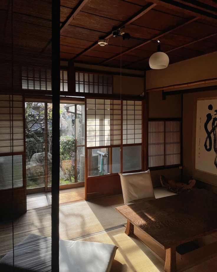 an empty room with tatami mats on the floor