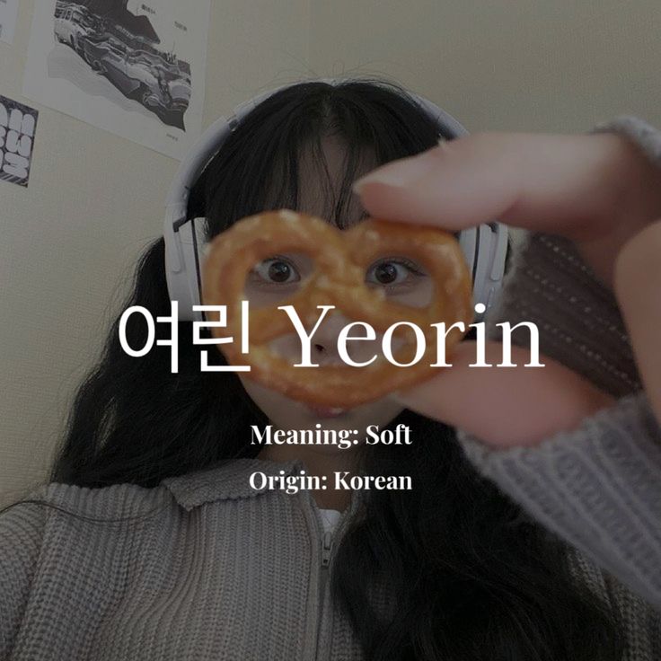 a person holding a doughnut up to their face with the words meaning soft origin korean