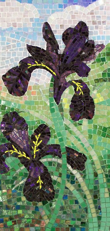 purple flowers are depicted on a mosaic tile background with green grass and blue sky in the background