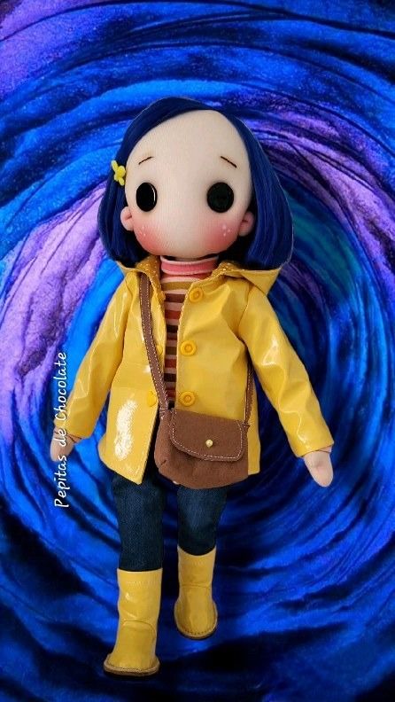 a doll with blue hair wearing a yellow jacket and boots, standing in front of a purple swirl