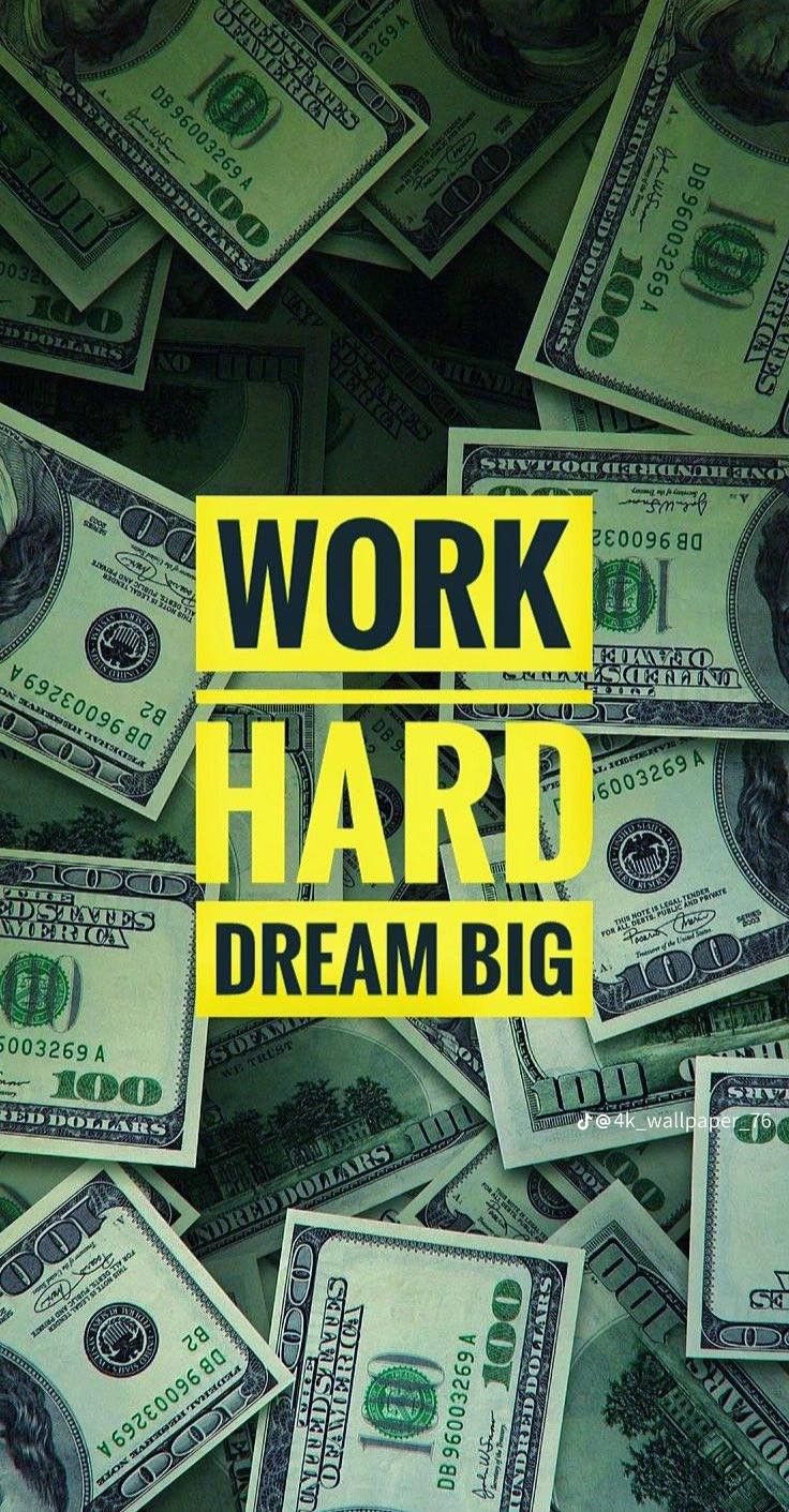 the words work hard dream big surrounded by money