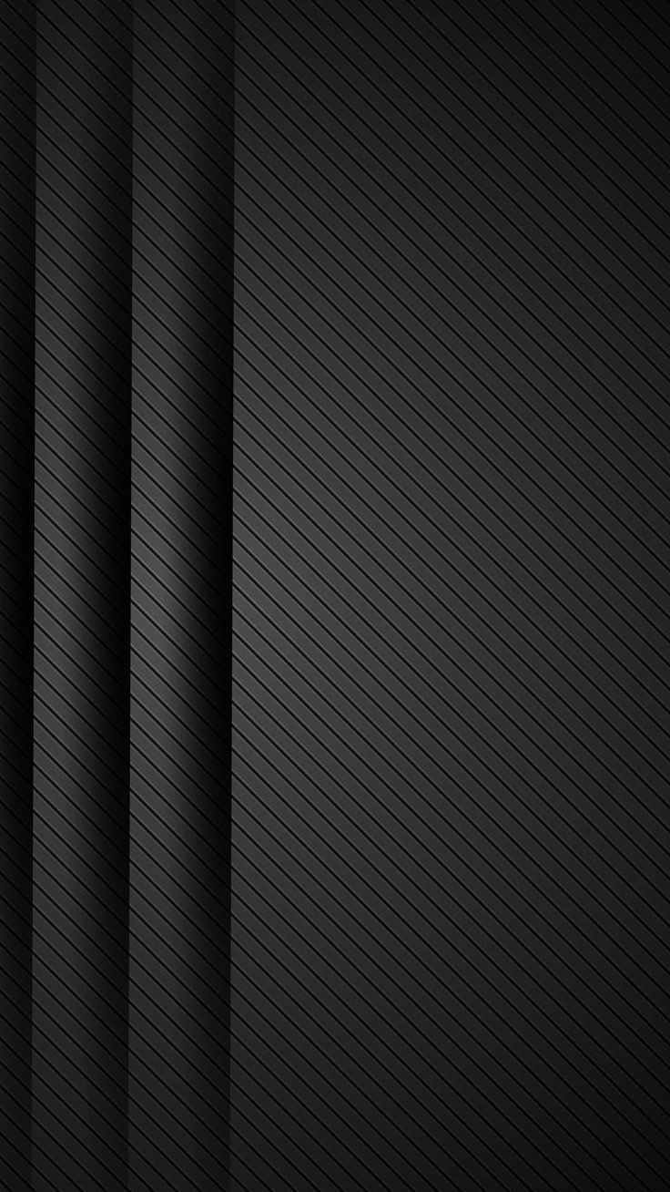 a black wallpaper with vertical lines on it