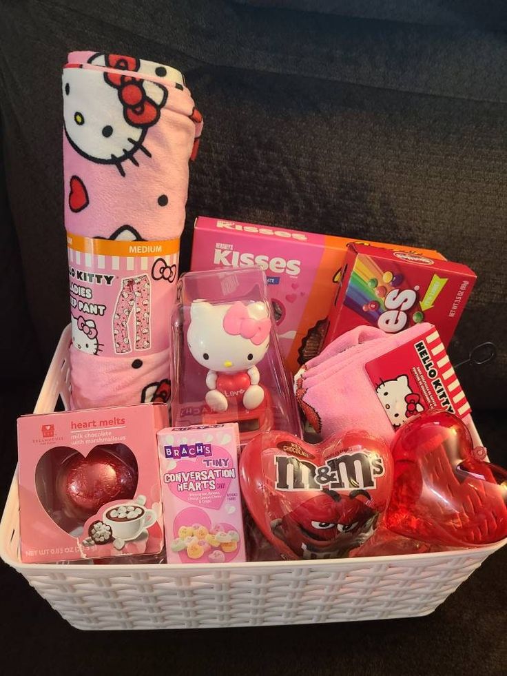 a hello kitty hamper filled with candy and other items