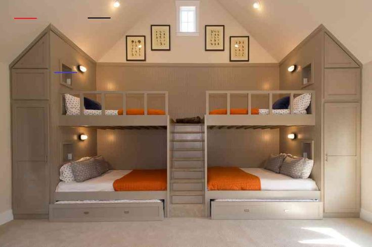 there are two bunk beds in this room with orange pillows on them and white carpet