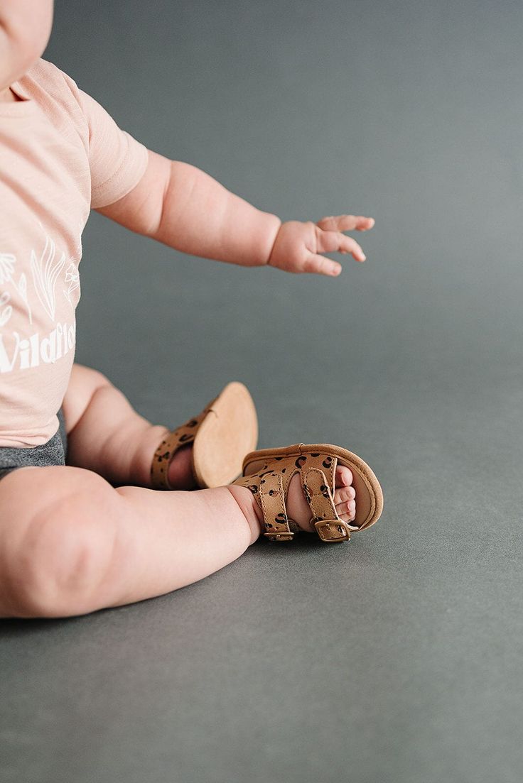 ***Looking for a larger size? Click HERE to see this same style with larger sizes in a hard sole.*** Our sandals are easy to dress up or down making them the best accessory. These cute sandals are just what your little one needs this summer! Genuine leather Leather lining Velcro strap for an easy on and off Leather soft sole provides comfort and protection for young babies and early walkers Handy heel strap makes sliding tiny toes into these shoes a breeze! Summer Open Toe Non-slip Clogs, Cute Closed Toe Summer Slippers, Summer Non-slip Open Toe Clogs, Summer Slide Sandals For Playtime, Brown Non-slip Slippers For Summer, Non-slip Brown Slippers For Summer, Brown Non-slip Summer Slippers, Comfortable Closed Toe Adjustable Sandals, Comfortable Closed Toe Brown Sandals