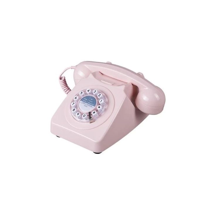 an old fashioned pink phone on a white background