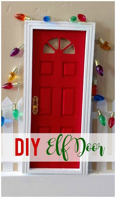 a red door with christmas lights around it and the words diy elf door above it