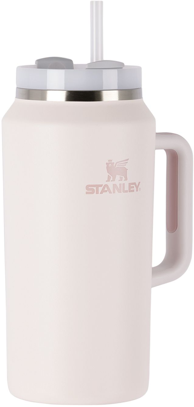 a white travel mug with a handle and lid is shown in front of a white background