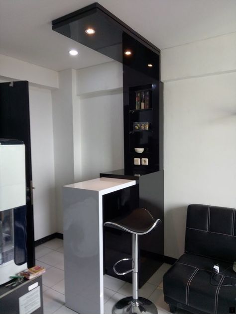 a black and white room with a bar stool