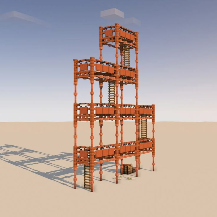 a large orange structure sitting in the middle of a desert