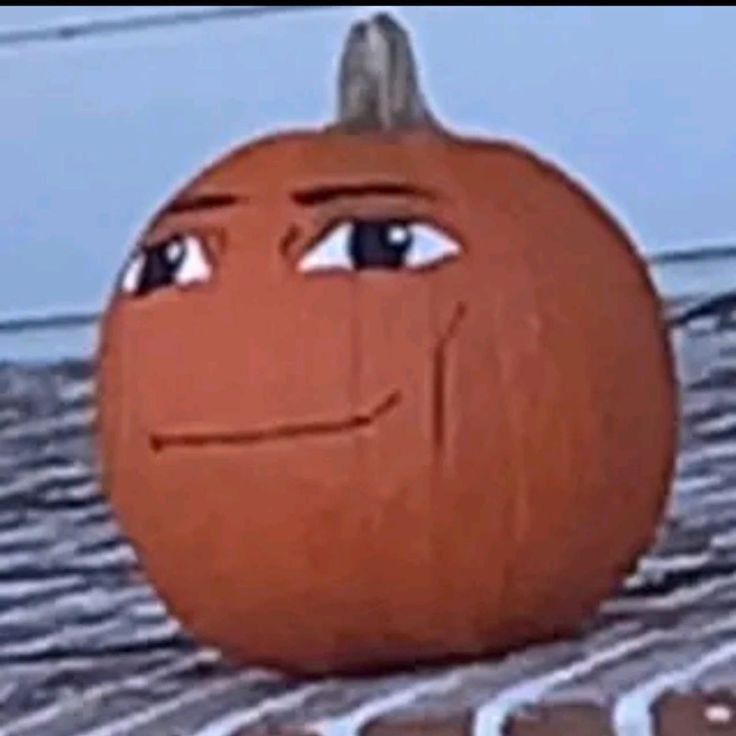 an animated pumpkin sitting on top of a table