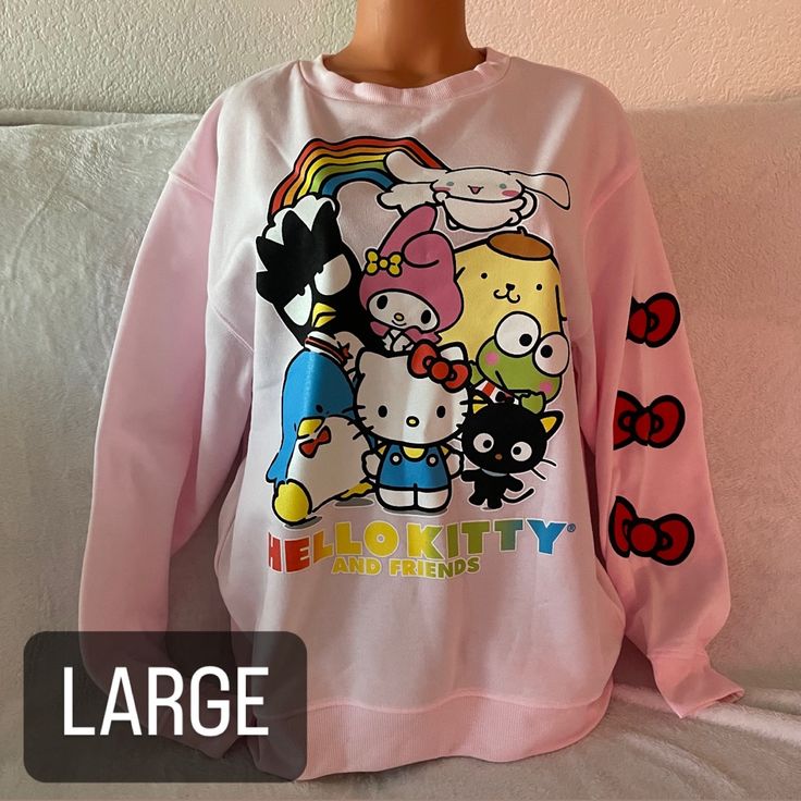 Hello Kitty And Friends Crewneck Sweater Size: Large Color: Light Pink Details: Has Hello Kitty And Her Friends (My Melody, Chococat, Pompompurin, Tuxedo Sam, Cinnamoroll, Keroppi, And Badtz-Maru) On The Front And 3 Hello Kitty Bows On The Left Arm Sleeves, And Nothing On The Back New Without Tags! Price Firm! Hello Kitty And Her Friends, Kuromi Clothes, Tuxedo Sam, Hello Kitty Bow, Hello Kitty And Friends, Badtz Maru, Bow Sweater, Pink Details, Graphic Sweaters