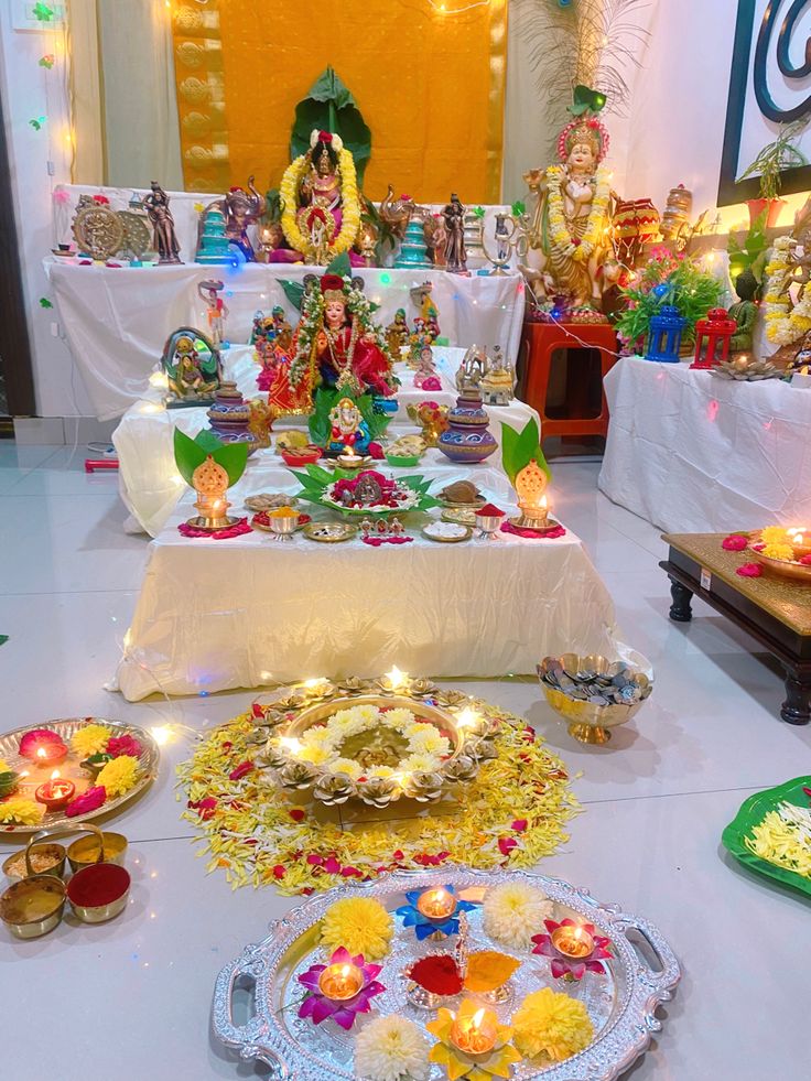 there are many decorations on the table for diwaling to be eaten and served