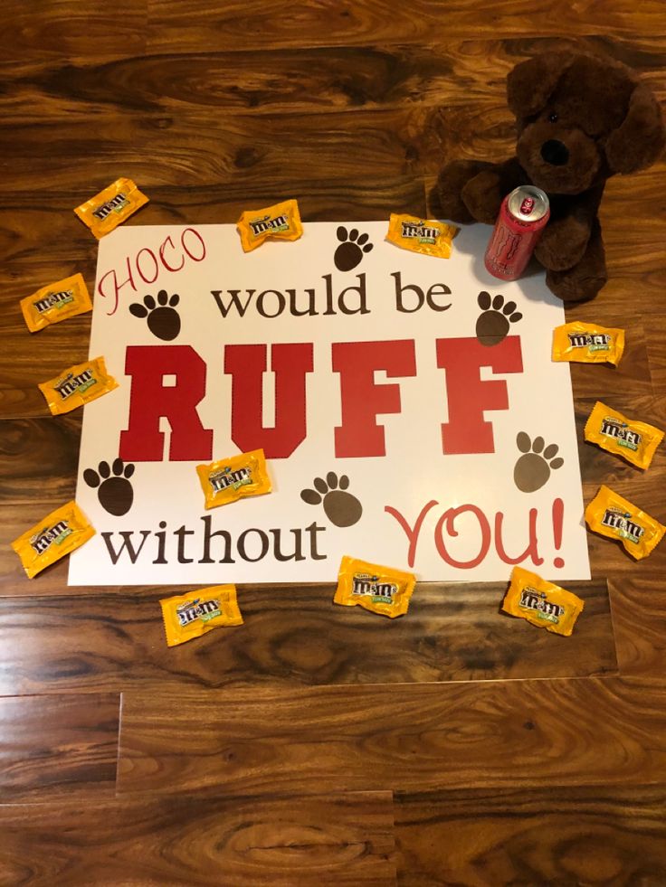 a teddy bear sitting next to a sign that says i would be ruff without you