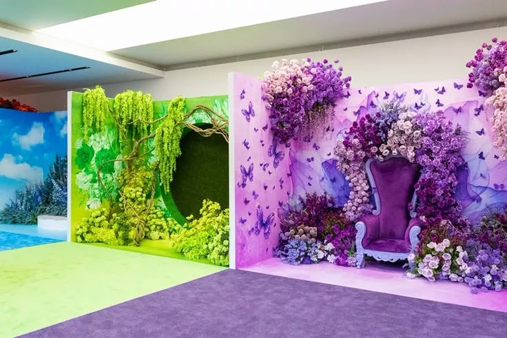 three different colored walls with purple and green flowers on them, one in the foreground