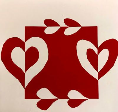 a red and white painting with two hearts on it's sides, in the shape of a box