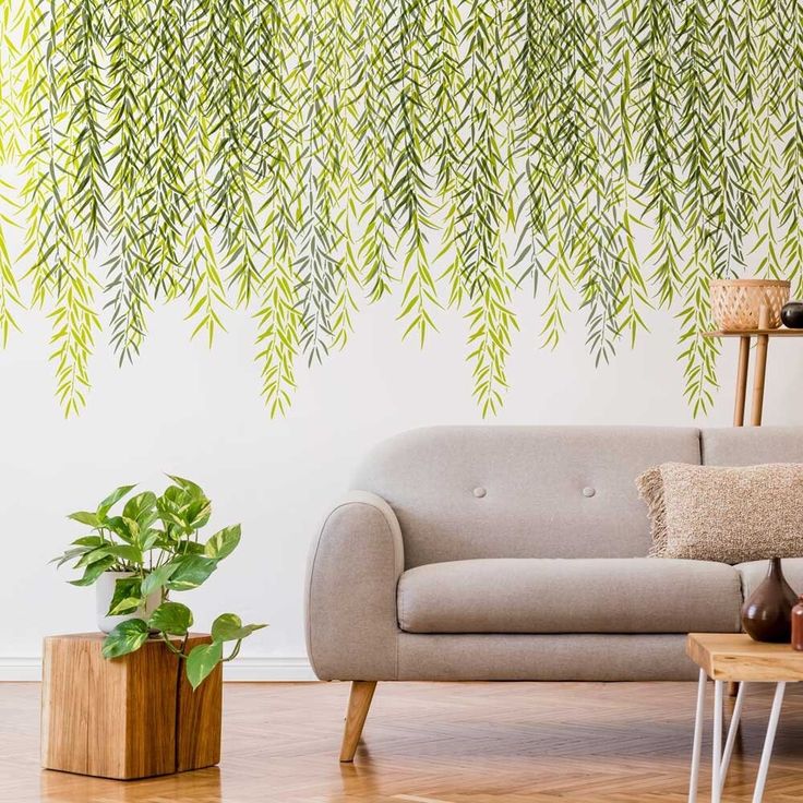 a living room with a couch, coffee table and potted plant