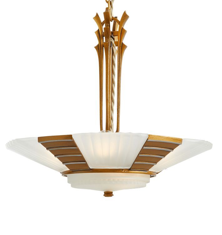 an art deco chandelier hanging from a ceiling fixture with gold trimmings