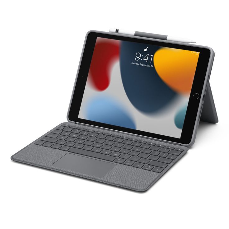 an ipad keyboard sitting on top of a tablet