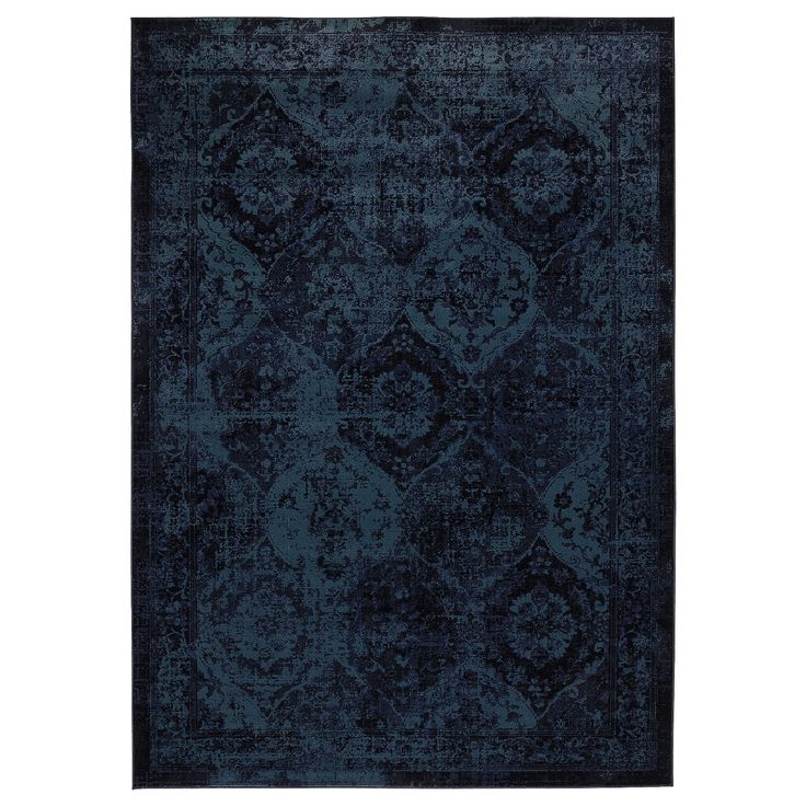 a dark blue rug with an intricate design