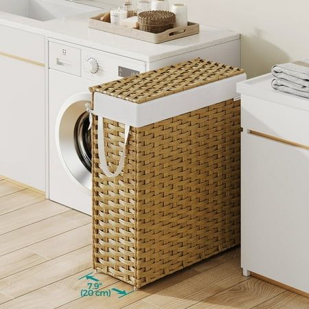 a laundry basket next to a washer and dryer