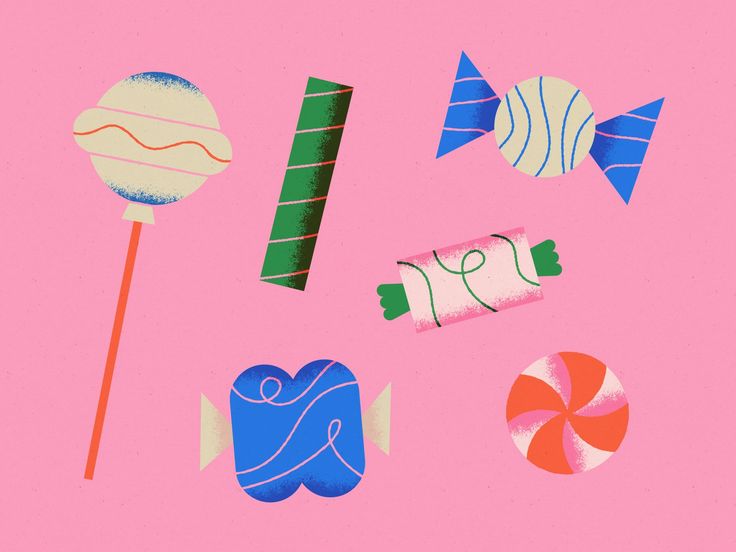 candy and lollipops on a pink background