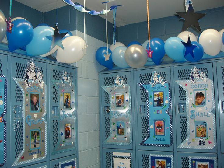 the lockers are decorated with blue and white balloons, streamers, and pictures