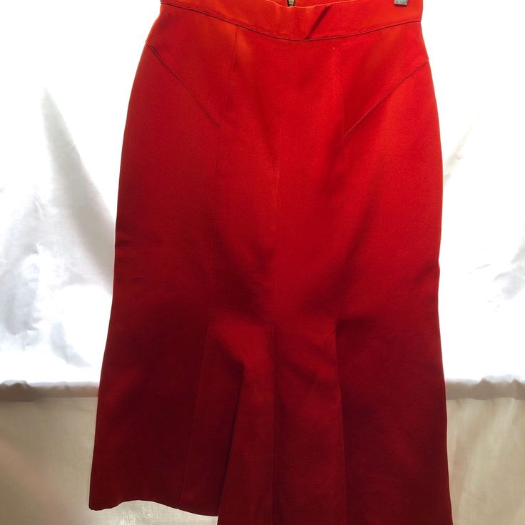 Burberry Lipstick Red Skirt Size 42. Although It Says 42 It Fits A Size Small. This Skirt Looks Amazing On. Great For That Xmas Party. Can Be Worn With A Simple White T-Shirt. I Bought It And Wore It A Few Times Then I Started Gaining Weight . Still Have Tags. It Needs A Loving Home Price To Go Chic Red Silk Bottoms, Elegant Red Midi Pencil Skirt, Fitted Full Skirt Bottoms For Cocktail, Elegant Red Lined Pencil Skirt, Elegant Red Pencil Skirt, Chic Red Knee-length Skirt, Red Knee-length Pleated Skirt, Red Fitted Skirt For Workwear, Red Fitted Midi Pencil Skirt