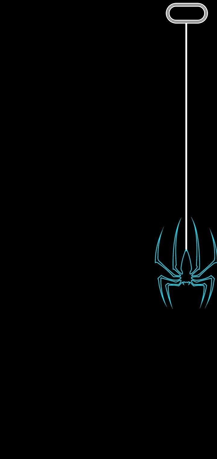 a spiderman hanging from a wire with its eyes closed