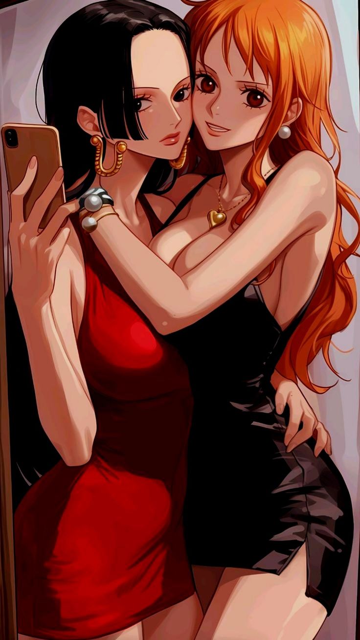 two women hugging each other in front of a mirror