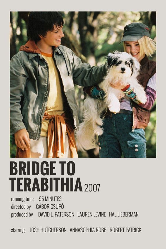 a man and woman holding a dog in front of trees with the title bridge to terabihia 2007