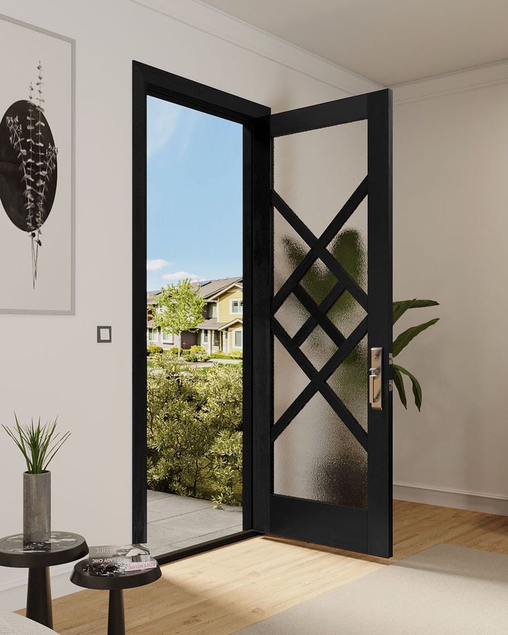 an open door leading into a living room with potted plants on the table and outside