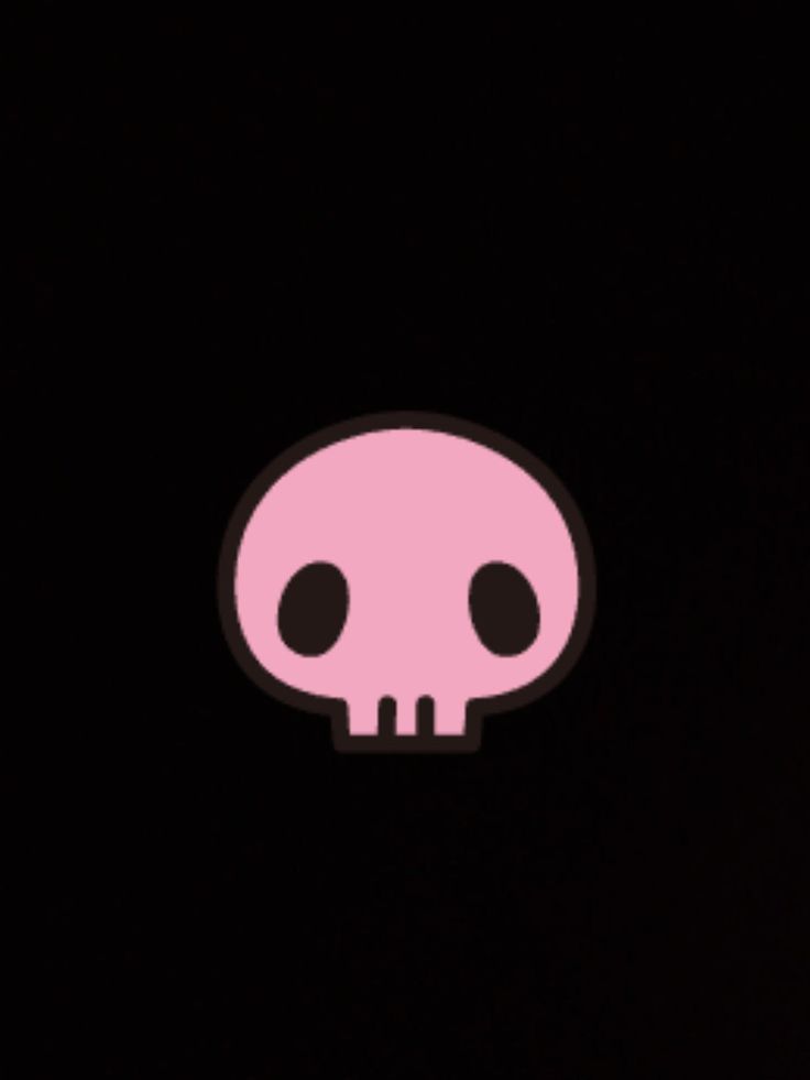 an image of a pink skull in the dark with black eyes on it's face