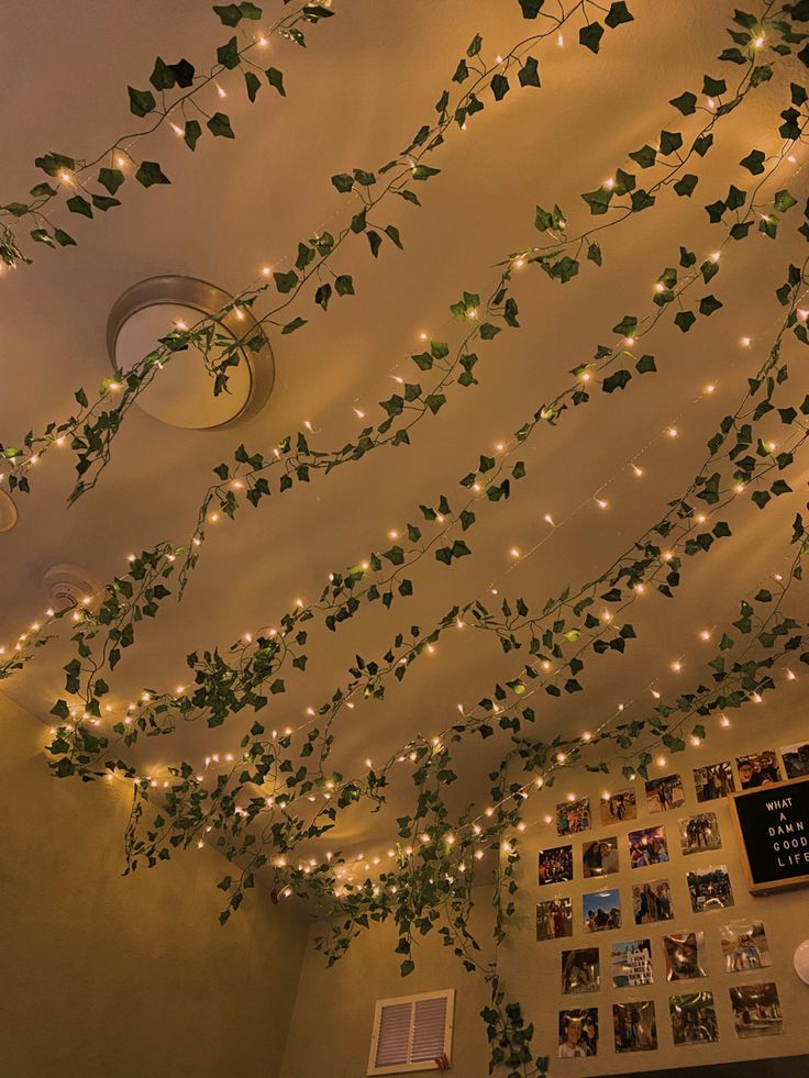 the ceiling is decorated with vines and lights