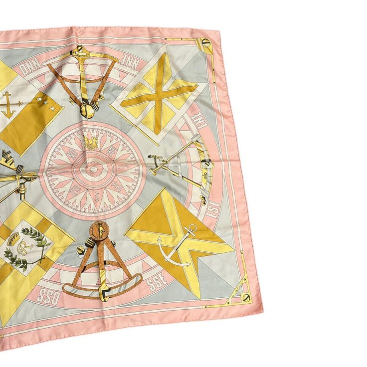 About This Piece: Hermes "Sextants Nautical" scarf is a vintage delight. Elegantly crafted from 90cm light pink silk, it features intricate sextant designs, evoking maritime exploration. This unique piece captures the romance of sea voyages and celestial navigation, all while embodying Hermes' tradition of timeless style and craftsmanship. Very good condition. In pictured condition. Silk is soft to the touch with the feel, still drapes beautifully.  Material: Silk Size: Approx. 35" x 35" (90cm x 90cm) Sextants On Attached Care Tag: Made in France Soie 100% Silk Dry Clean Only   Please refer to the dimensions in the description above for accurate measurements. Please reach out to the seller with any questions on dimensions or fit prior to purchase. Pink Hermes, Celestial Navigation, Nautical Scarf, Pink Silk Scarf, Hermes Scarves, Nautical Vintage, Cashmere Scarves, Hermes Accessories, Vintage Silk Scarf