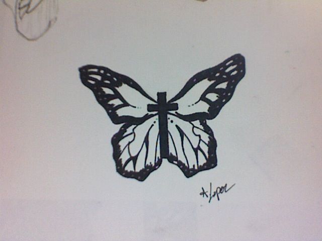 a drawing of a butterfly on a piece of paper