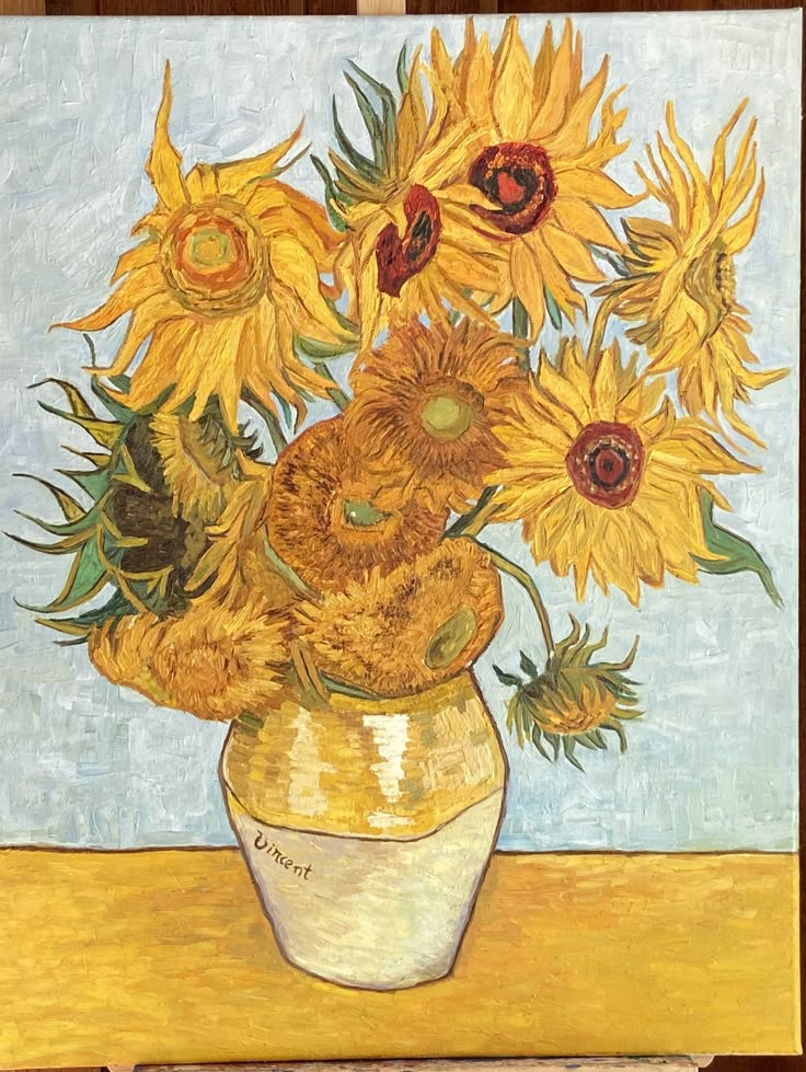 a painting of sunflowers in a yellow vase