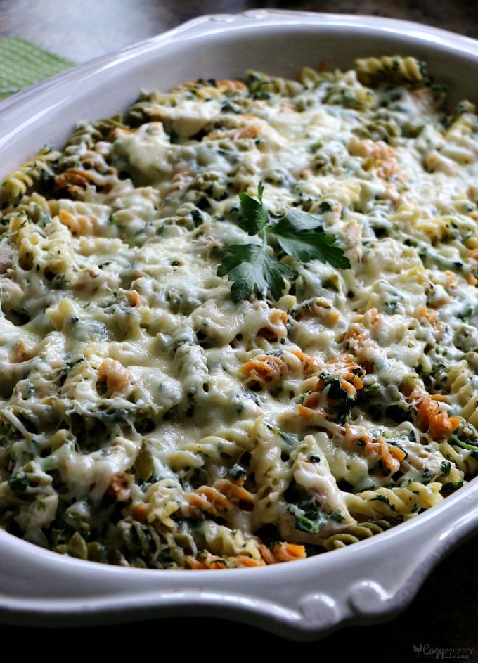 a casserole dish filled with pasta and vegetables