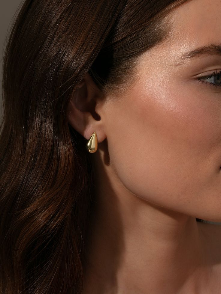 These Teardrop Stud Earrings are the ultimate cool girl accessory. Coming in gold and silver, these statement earrings will effortlessly pair with anything in your jewelry collection. For an ear stack our stylists can’t stop wearing, pair these teardrop earrings with a pair of huggie earrings. Modern Tarnish Resistant Teardrop Earrings, Modern Tarnish-resistant Teardrop Earrings, Chic Teardrop Earrings Tarnish Resistant, Trendy Gold Teardrop Hypoallergenic Earrings, Trendy Gold Hypoallergenic Teardrop Earrings, Chic Tarnish-resistant Teardrop Jewelry, Trendy Teardrop Yellow Gold Hoop Earrings, Trendy Yellow Gold Teardrop Hoop Earrings, Chic Drop Hoop Earrings