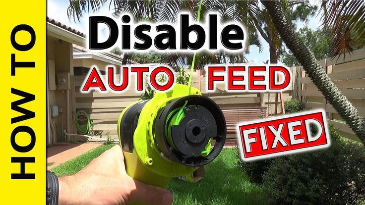 a hand holding a green lawn mower with the words disable auto feed fixed