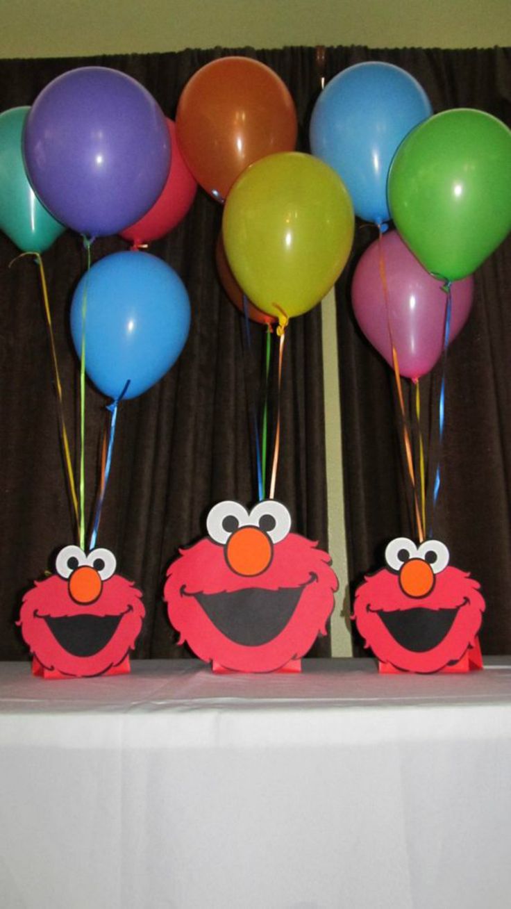 sesame street birthday party decorations with balloons