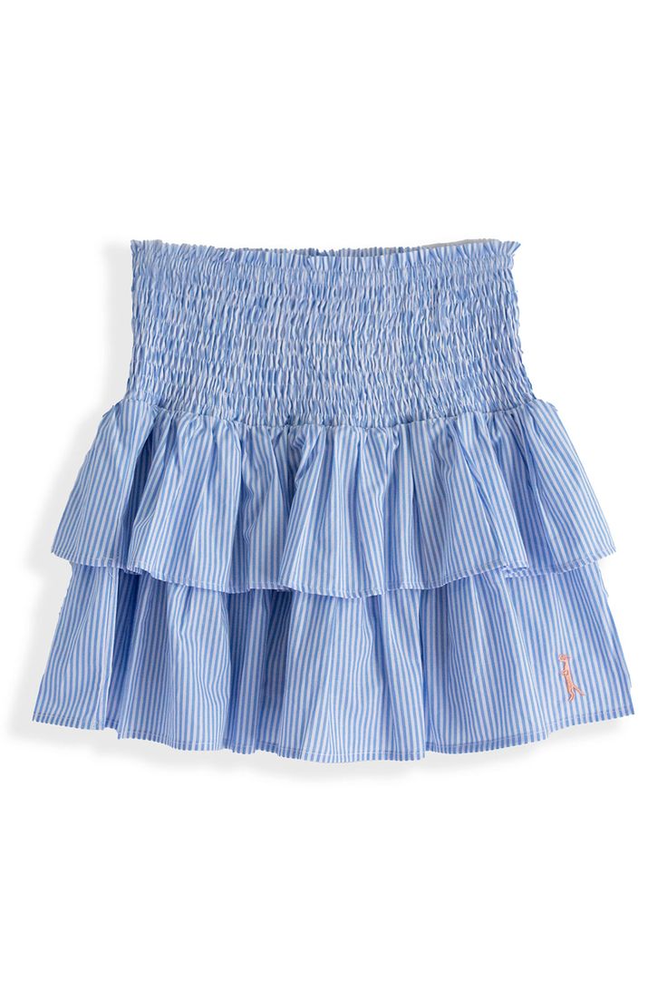 Take a walk on the preppy side with our Seersucker Ruffle Skirt. This tier ruffled mini with built in shorts is made from our classic seersucker chambray print, paired perfectly for your next social beach event. XS-XL sizes Fabric Content: Skirt - 100% Cotton Shorts 100% Rayon Care instructions: Machine wash cold. Tumble dry low. SSW23027 Love Shack Fancy Skirts, Summer Skirted Skort With Ruffles, Ruffled Skirted Skort For Summer, Spring Mini Ruffled Skirt, Striped Ruffled Bottoms For Summer, Spring Cotton Skort With Ruffles, Cotton Ruffle Mini Skirt, Striped Tiered Skirt For Summer, Cotton Mini Skirt With Ruffles