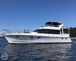 a large white boat floating on top of a body of water