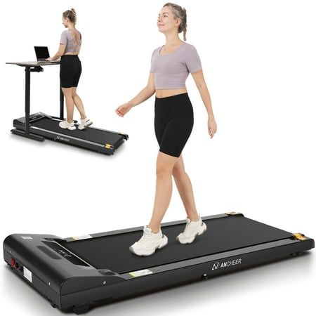 a woman is walking on a treadmill