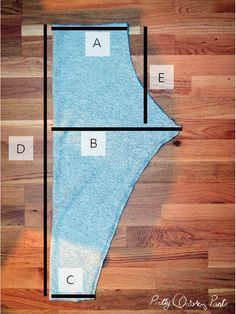 a piece of cloth is shown on the floor with an area for it to be cut out