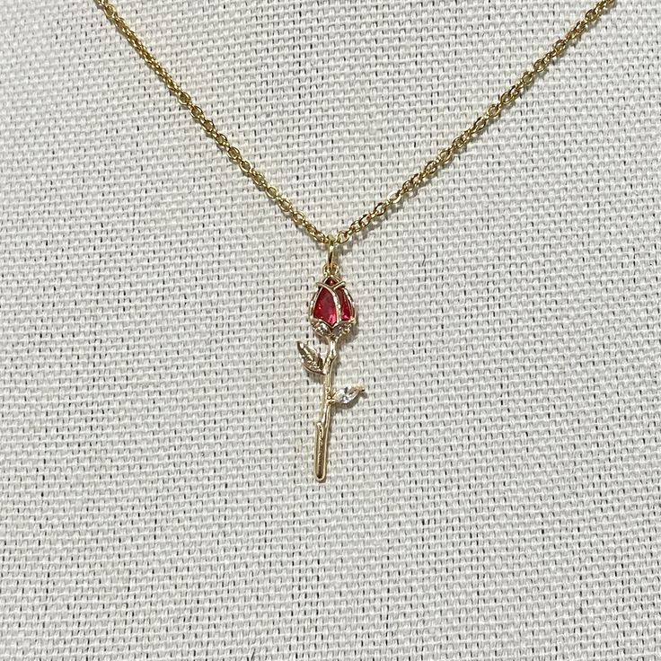 Romantic Rose flower Nekclace, Propose Red Rose Pendant Jewelry for Women, Girls, Floral Jewelry for Her  Item details ✰ Color: gold ✰ Finish:  14K gold plated pendant ✰ Shimmering high quality 15-19" chain length ✰ High quality clasp to finish  ✰ Comes in a cute gift box, perfect for gift-giving! Valentine's Day Rose Design Necklace For Party, Red Rose Design Necklace For Wedding, Elegant Rose Red Necklace With Rose Design, Red Rose Necklace, Red Flower Necklace With Rose Design, Rose Red Flower Pendant Necklace For Gift, Red Rose Design Flower Necklace, Rose Red Flower Necklaces With Rose Design, Golden Rose Necklace